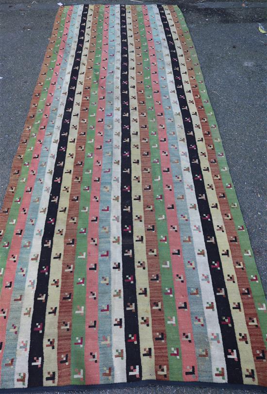 A Kelim carpet Approx. 368cm x 120cm